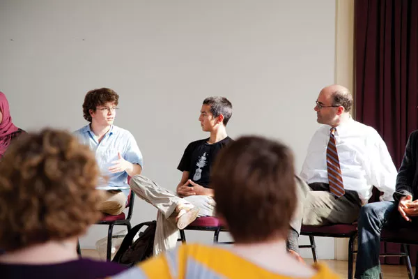 Community Council representatives discuss issues, organizations, and campus activities with Provost Peter Laipson.