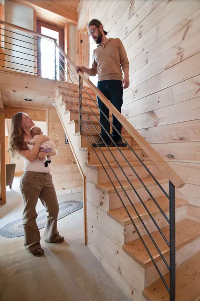 Environmentally friendly white pine was used throughout the house. The railing was fabricated by a local craftsman. - DEBORAH DEGRAFFENREID