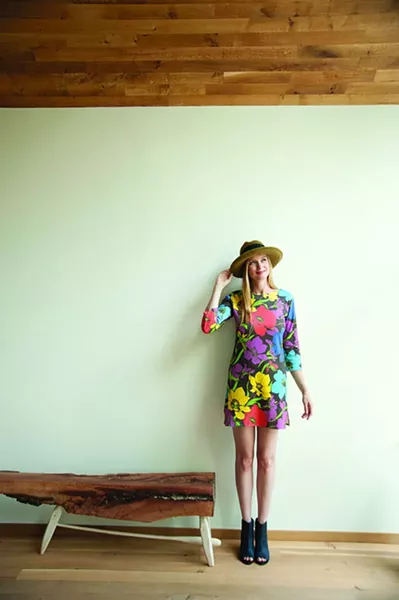 Esther de Jong in a floral organic cotton jersey dress ($189) by Gwenno James and “Cassidy” Hand Blocked Olive Fur Felt Homburg ($288) by Katie Burley. - KELLY MERCHANT