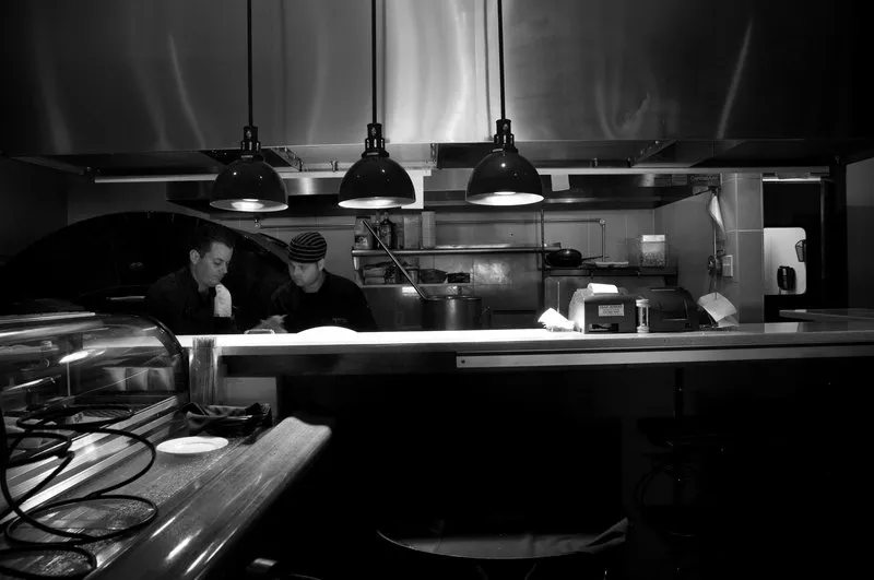 Executive Chef Danny DeLorenzo (left) with Head Lunch Chef Brian Bauhofer in the kitchen at Aperitivo. - HILLARY HARVEY