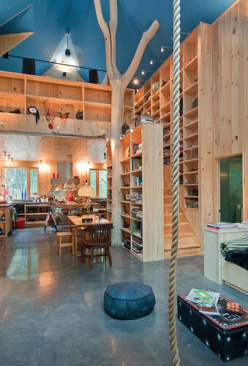 Looking past the rope swing up to the loft bedroom from the living room. - DEBORAH DEGRAFFENREID