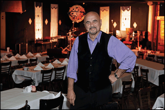 Proprietor Phil Ciganer in the Towne Crier Cafe. - DAVID CUNNINGHAM