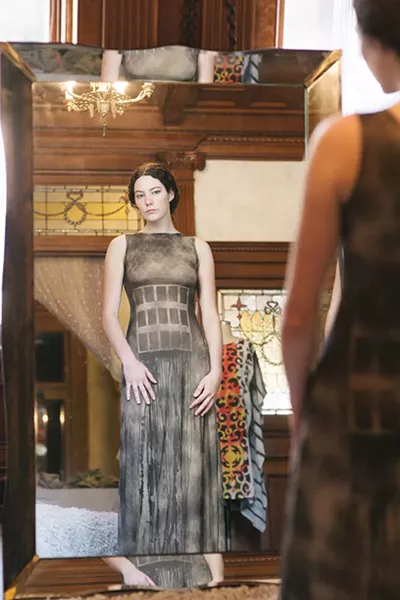 Rae Hatch tries on a dress at LALOON in Hudson. - THOMAS SMITH