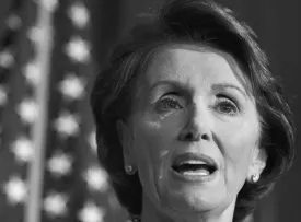 Representative Nancy Pelosi answers questions during a news conference on Capitol Hill the day after Democrats took control of the House for the first time in 12 years, November 8, 2006. Pelosi will be the first woman to hold the post of House Speaker. REUTERS/Jim Young