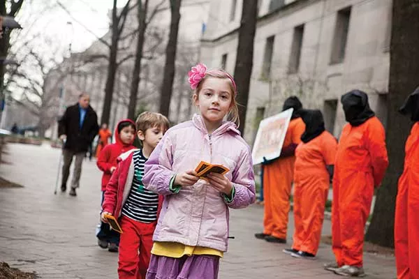 Sasha Langley and friends handing out pamphlets outside the Department of - Justice on January 11, 2013. - SCOTT LANGLEY