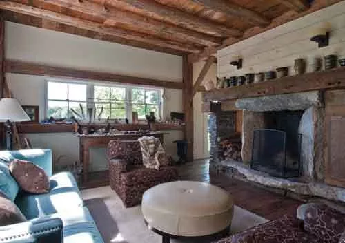 The family room where pottery by friends and family members lines the mantel. - DEBORAH DEGRAFFENREID