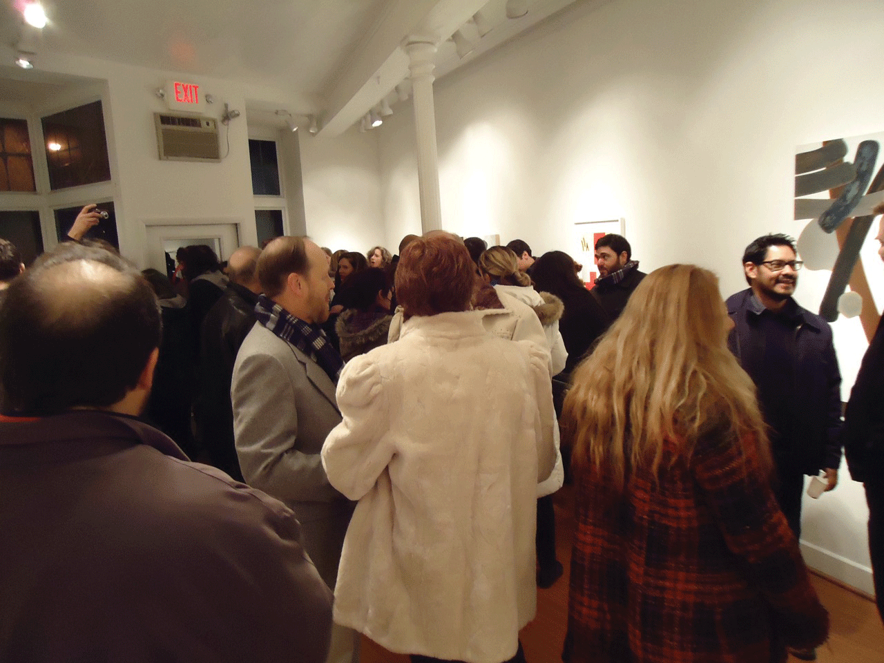 The opening reception for "Go West," featuring works by Karlos Carcamo, Greg Slick, and Eleanor White, at Beacon Artists Union in Beacon on January 14. - LISA ZUKOWSKI