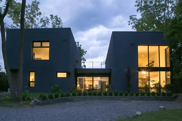 PAINTER & SCULPTOR, Hudson, NY - This studio and residence for two artists is set in a historic neighborhood of Hudson, NY. Designed with the Passive House standard as a guide this project features exterior walls constructed with Insulated Concrete Forms, triple glazed fiberglass windows and a high efficiency gas boiler providing radiant heat - DAN KARP