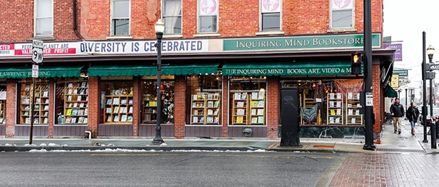 Inquiring Minds Bookstore is an independent bookshop with locations in Saugerties and New Paltz that’s not afraid to wear its politics on its storefront. - PHOTO BY ANNA SIROTA