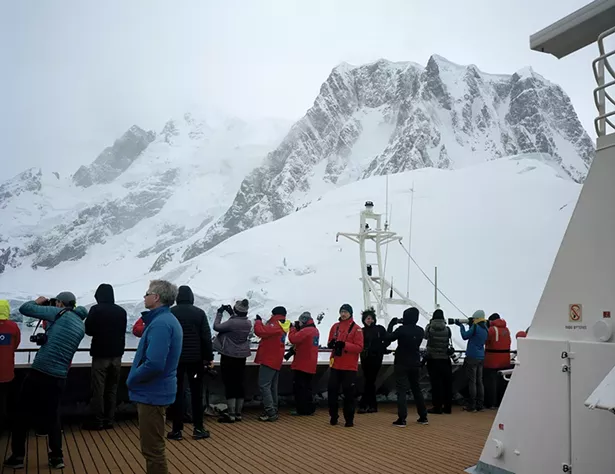 More than 40,000 tourists visit Antarctica each - year. Over the next five years, with projected - milder weather and reduced sea ice, the industry - is expected to grow by 40 percent. - PHOTO BY MADELINE COTTINGHAM