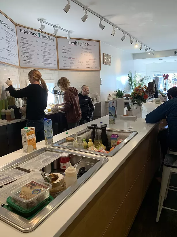 Little Apple staff in action before the pandemic. - LITTLE APPLE CAFÉ
