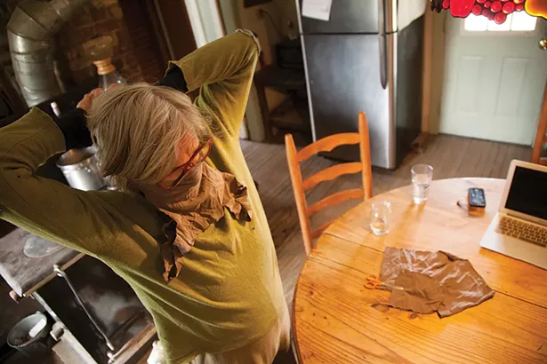 "The other day we made masks. The first batch were made out of vacuum bags. We quickly learned they weren't breathable. Eventually we came up with a simple mask made out of t-shirts. Here is my mother, Jennifer Cottingham, trying one on." - MADELINE COTTINGHAM