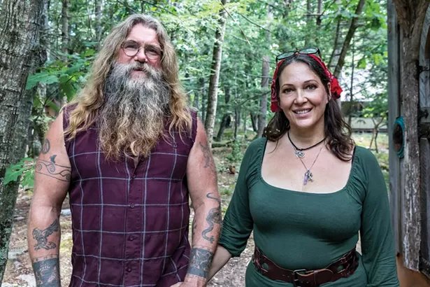 Hoppy Quick and Julie Snyder at home. They met at a 2017 tiny house convention and soon realized they were kindred spirits. “We’ve had parallels running through our whole lives,” explains Quick. - PHOTO BY WINONA BARTON-BALLENTINE