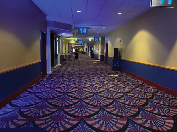 The corridor of Showcase Cinema de Lux in White Plains on October 28. - PHOTO BY DAN FISHER
