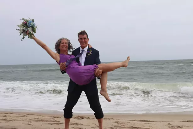 Kevin Misely and Heather O'Leary on the beach in Long Beach Island, New Jersey, where they had an impromptu wedding in late October. - PHOTO BY HOLLY MISLEY