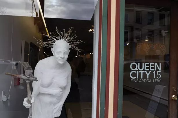 Queen City 15 is a member-run art gallery on Main Street. The sculpture in the window is Gnome Lisa by Lisa Winika. - PHOTO BY DAVID MCINTYRE