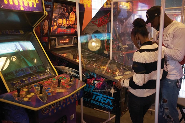 Happy Valley Arcade Bar features vintage pinball machines and arcade games. - DAVID MCINTYRE