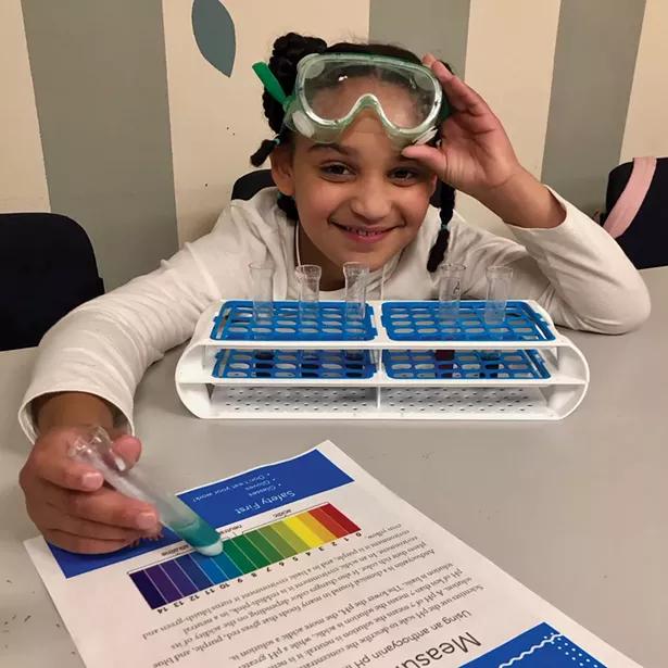 Exploring chemistry at the Girls Science Club afterschool program.