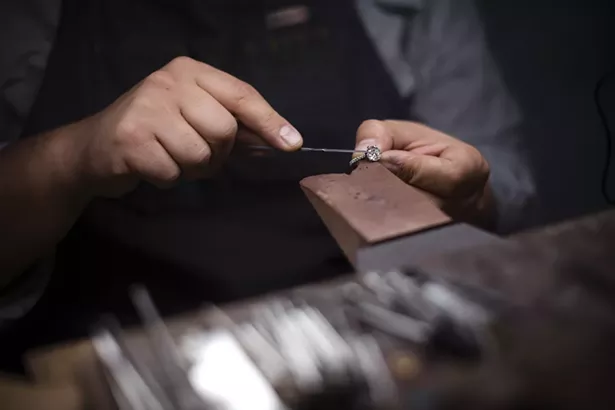 David finishing a ring at the bench.