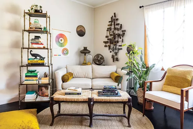“My personal aesthetic is vintage eclectic,” Salvemini says. “I like to source previously owned vintage or antique pieces because the world has enough stuff.” She tends toward a tonal color palette with nigh contrast pops of color. - WINONA BARTON-BALLENTINE