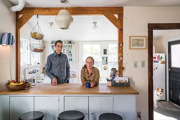 Kinsella and Potter in their kitchen. With their children soon leaving home for college, the couple are contemplating their next chapter. “I don’t foresee us leaving this house,” says Kinsella. “I feel like we’ve become a part of the community fabric. The house and the area are really our home.” - WINONA BARTON-BALLENTINE