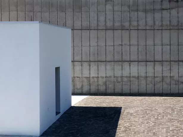 The design of the new pavilion will echo the main building's rectilinear shape and concrete exterior.
