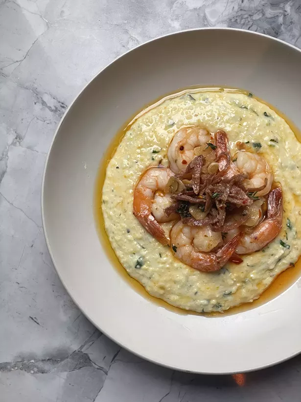 Though sourcing issues have delayed the launch, Tabla is planning to have shrimp and grits on the brunch menu soon.