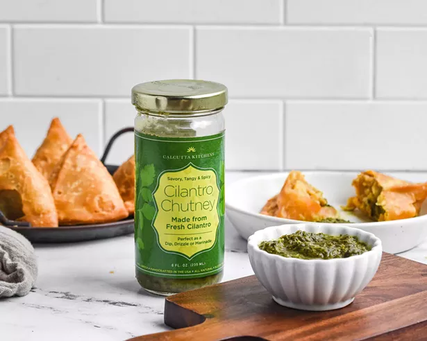 Spiced potato samosa and chutney is a typical tiffin food, which Goswami offers at Calcutta Kitchens in Kingston.