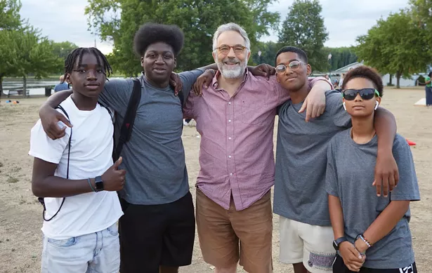 Hudson Common Council President Tom DePietro with Cruz Cora, Derick Benn, Joshua Ramirez, and Megan Carr at Waterfront Wednesdays. - DAVID MCINTYRE