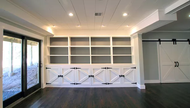 This Catskill Farms walkout finished basement boasts wood floors and contemporary farmhouse details. - IMAGES COURTESY OF CATSKILL FARMS