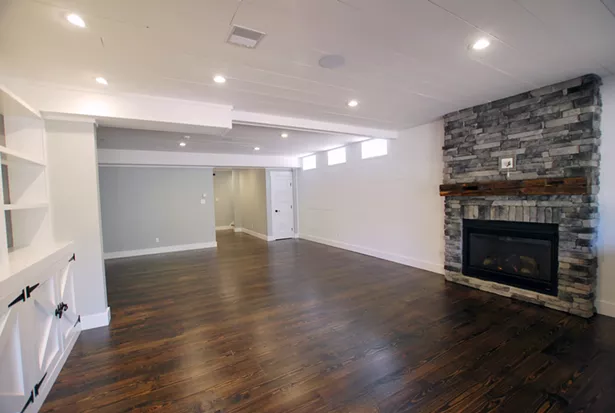 The main entertaining area of a finished basement of a Catskill Farms home - IMAGES COURTESY OF CATSKILL FARMS