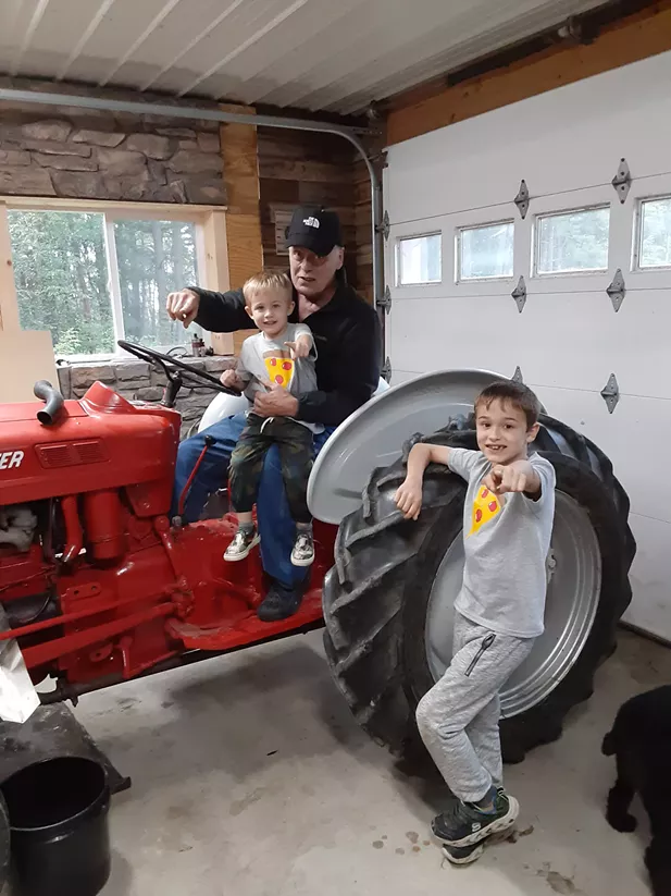 Joseph McFadden, pictured with his grandchildren, has returned to farming, thanks to innovative stroke software found throughout the Albany Med Health System.