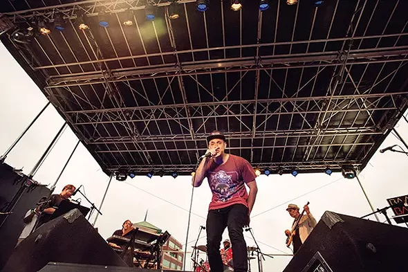 Hip-hop artist Decora performing at the Newburgh Illuminated Festival - RUEDI HOFMANN