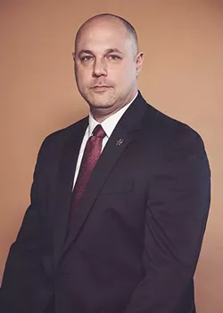Lt. Paul Arteta of - RACHEL BRENNECKE