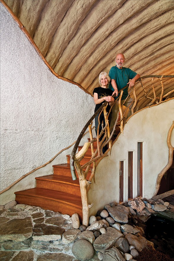 Linda and Andy Weintraub in the entrance way of their home. In building and maintaining their property they continually ask themselves, "How much life can we nurture? How much life can we provide for others? How much life can we utilize for ourselves? - DEBORAH DEGRAFFENREID