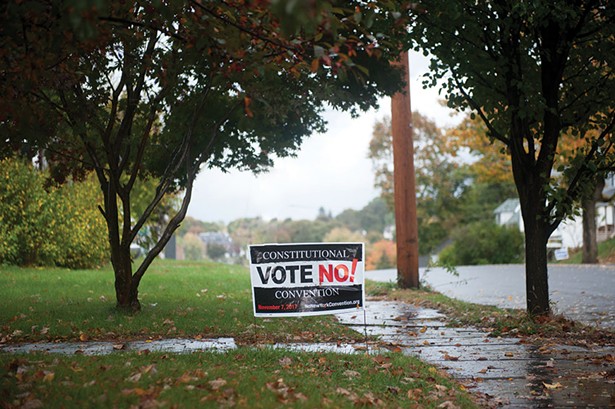 A no-vote yard sign on a lawn in Kingston.