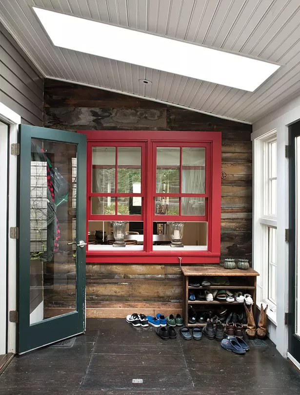 Smith added an insulated glass door between the kitchen and the three-season porch as well as a skylight, allowing the home’s ambiance of interconnected indoor-outdoor spaces to remain during colder weather. - DEBORAH DEGRAFFENREID