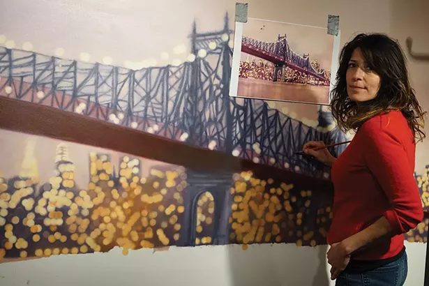 Sonne Hernandez with her artwork at PLACE gallery in Millerton. - JOHN GARAY