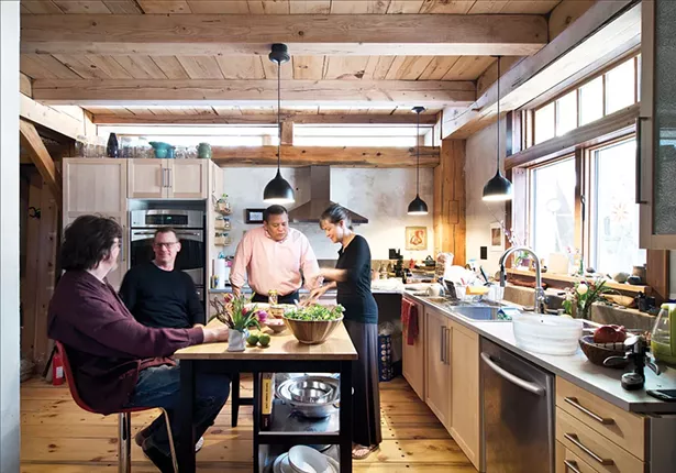 The home’s south-facing kitchen is aligned perfectly with the solstice—the sun rises in the kitchen window at 6am each June 21st. - DEBORAH DEGRAFFENREID