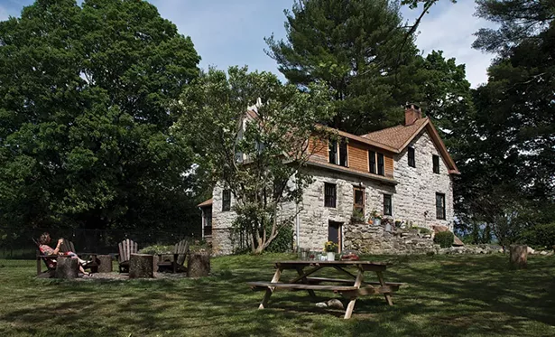 Zeller’s yard is perfectly configured for rustic entertaining. - DEBORAH DEGRAFFENREID