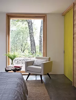One of the home’s two bedrooms. Super insulated “rain-screen” walls allow the home’s temperature to remain constant and the air flowing and comfortable throughout the year. - DEBORAH DEGRAFFENREID