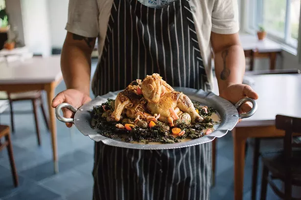 Family-style chicken for four at Trotwood. - NONI BRUECKNER