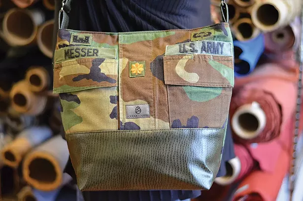 A tote made from a retired US Army uniform paired with manufacturing straps donated by Ultrafabrics in Tarrytown.