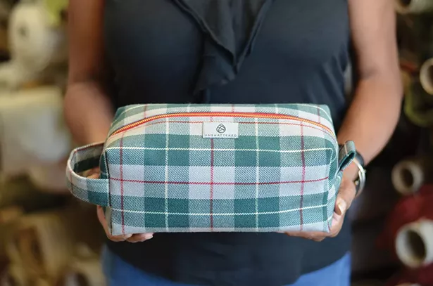 A toiletry kit made from 1955 Mercedes Benz upholstery.