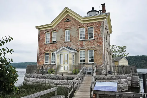 Closed in 1954 and fallen into disrepair, the Saugerties Lighthouse is now on the - National Register of Historic Places and operates as a bed and breakfast. - PHOTO BY JOHN GARAY