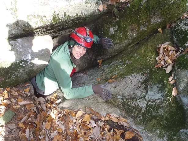 Cara Gentry entering a Hudson Valley cave. - PHOTO: ERIK RICHARDS