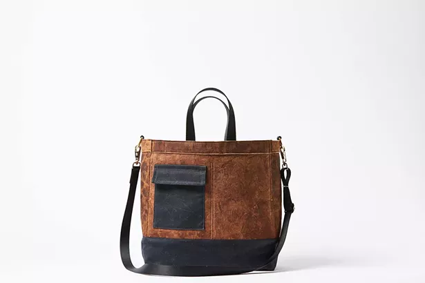 The Mylo Driver Bag uses mycelium leather.