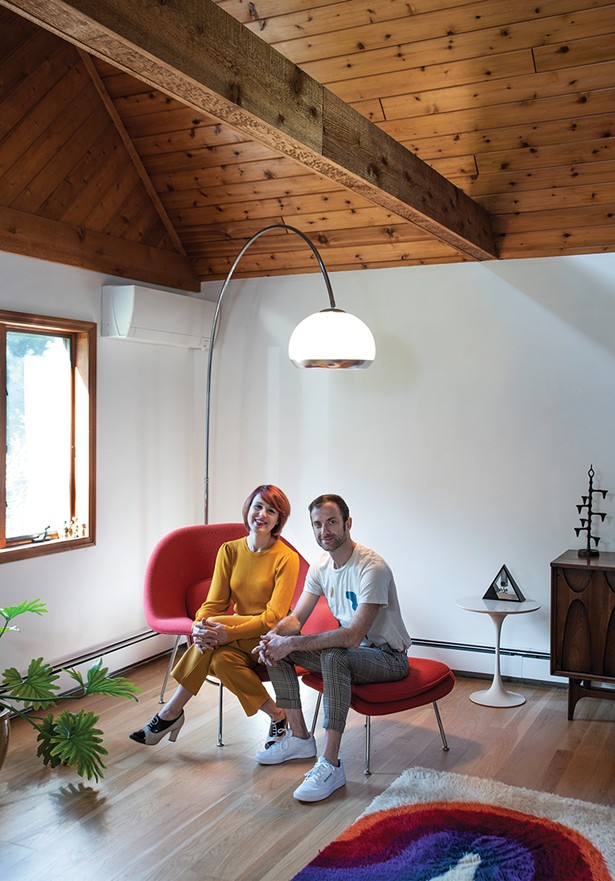 Hilary Davis and Jordan Moser on their Eero Saarinan “Womb Chair” under the Arc Lamp, made by the Guzzini brothers in Italy. Moser found the iconic Midcentury Modern lamp on Craigslist in the dead of winter. “It had seen better days,” Moser remembers. “The head had been ripped off, the sockets removed—it was in pieces.” Still, he drove up to Woodstock in his Honda Civic “with fingers crossed” and was able to score the piece for $125. “For a moment it seemed like it wasn’t going to fit in the back,” he recalls However, after some dissembling, he was soon driving down the thruway with the lamp hanging out the back window. After an additional $20 investment and a “night doing surgery,” he was able to surprise Davis with a new lamp arcing over the living room. “That was my favorite part,” says Moser. “She got so excited; we did a little dance in the living room.” - PHOTO: DEBORAH DEGRAFFENREID