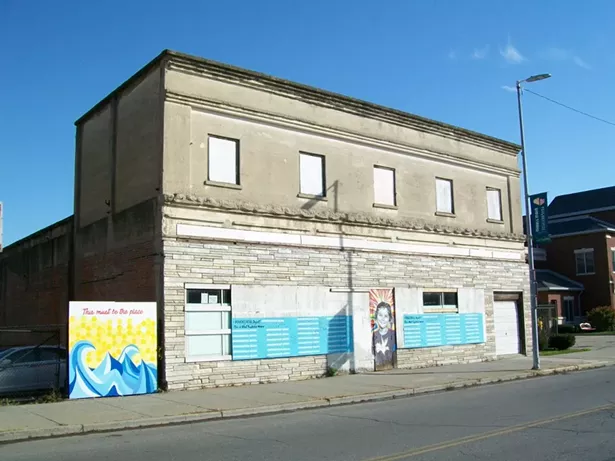 The boarded-up Trolley Barn before renovations began.