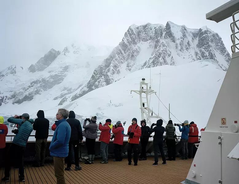 More than 40,000 tourists visit Antarctica each - year. Over the next five years, with projected - milder weather and reduced sea ice, the industry - is expected to grow by 40 percent. - PHOTO BY MADELINE COTTINGHAM